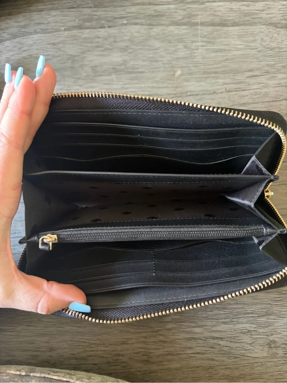 kate spade Black Pebbled Leather Zip Around Wallet with Gold Logo